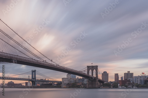 Brooklyn and Manhattan bridge over East River with skyline of Brooklyn, viewed from Manhattan, New York, USA