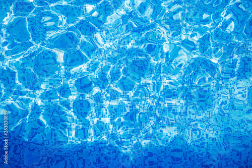 Blue clear water in swimming pool.