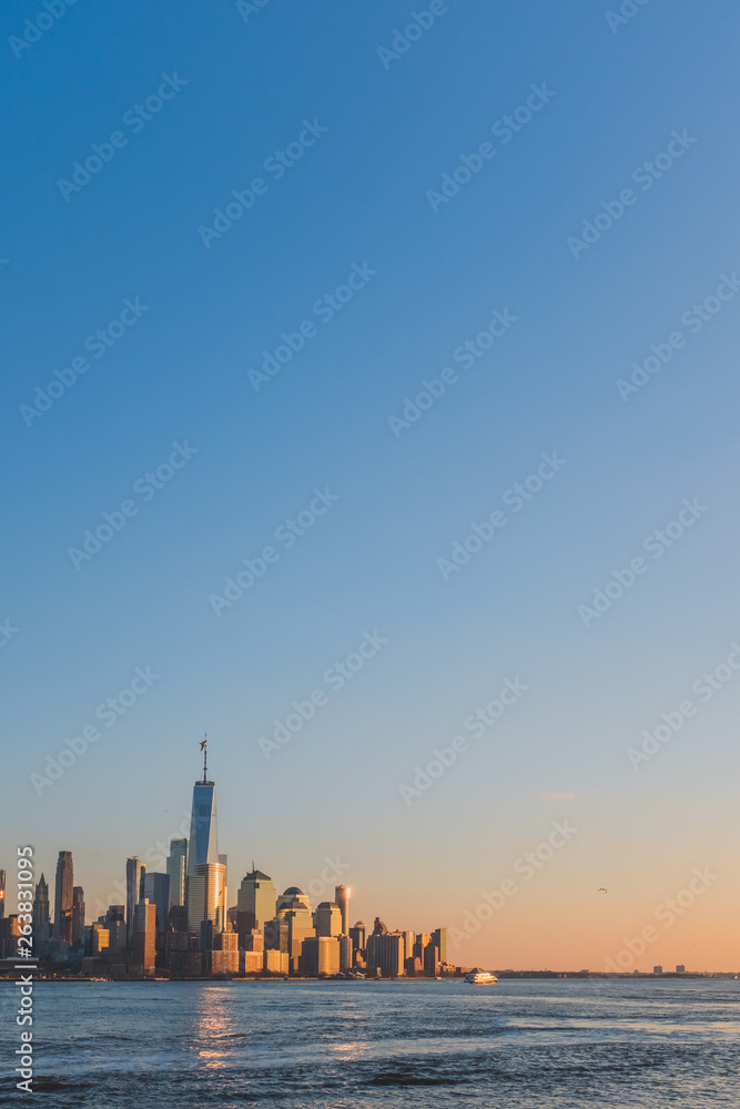 Skyline of downtown  Manhattan of New York City at dusk, viewed from New Jersey, USA