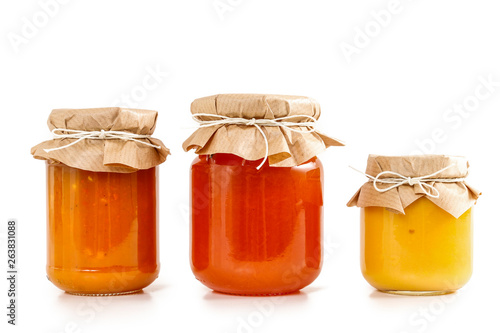 Colorful jams in glass jars