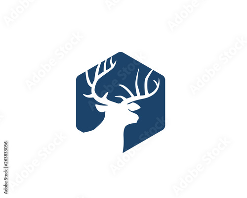 dear head with antlers as negative space inside hexagon logo