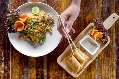 Spring rolls and Pad Thai photo