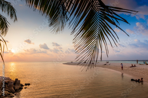 Fototapeta Naklejka Na Ścianę i Meble -  Sunset on the beach of a Maldives island