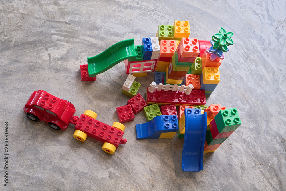 Fototapeta premium Colorful plastic toys for children to create an amusement park and an imaginary city.