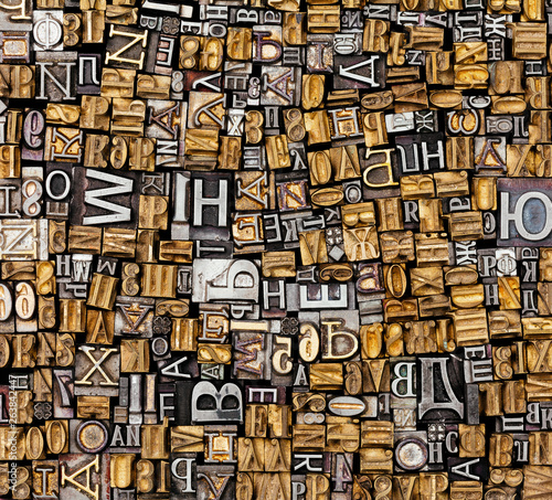 Dusty old metal letterpress type pieces background