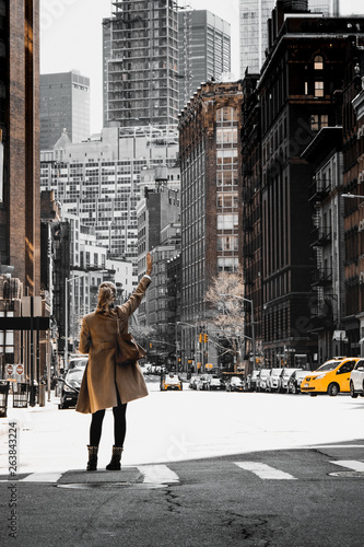 Photography Businesswoman calling a cab in New York City