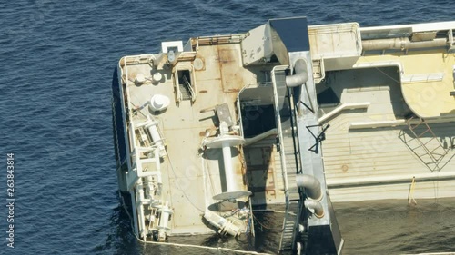 Aerial view of capsized trawler after severe storm  photo