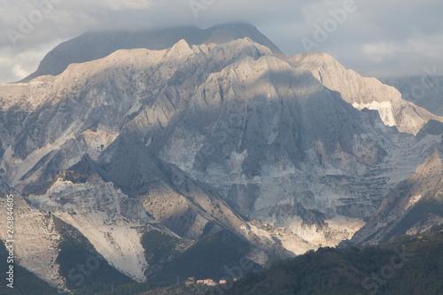 View of Carrara Marble Quarries and Apuani Mountains from Marina di Carrara Italy