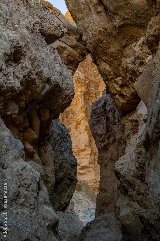 The entrance to the cave. Cave inside close-up with depth of field. Death Vally