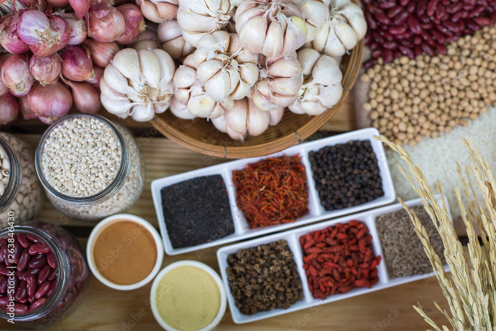 Cereal grains , seeds, beans,spices on wooden background. Cereal grains , seeds, beans,spices on wooden background.