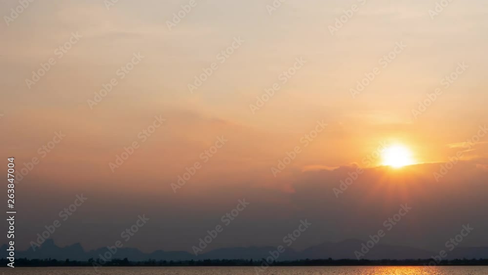 Time lapse nature background. Sunrise time interval. The movement of clouds and Sun. Time lapse nature background. Sunrise time interval. The movement of clouds and Sun.