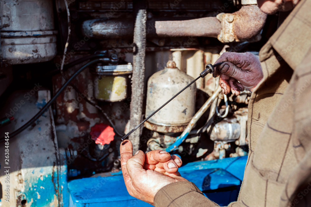 Check engine oil level. Tractor maintenance. Check engine oil level. Tractor maintenance.