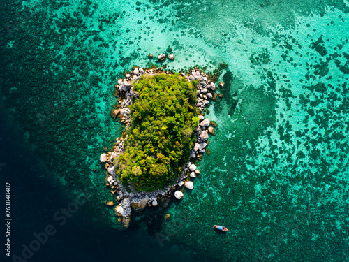 Aerial view of tropic island in the sea photo