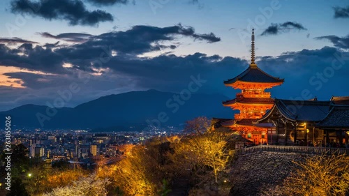 Time lapse of Kyoto city with red pagoda at twilight, Japan.  photo