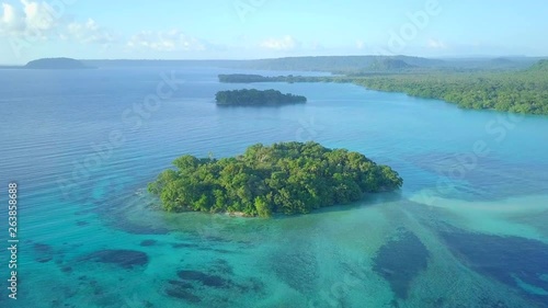 Aerial: Jungle on an Island off the Coast in Espiritu Santo, Vanuatu
