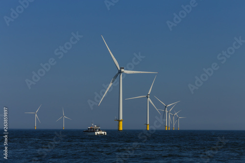 view of windmills of Rampion windfarm off the coast of Brighton, Sussex, UK