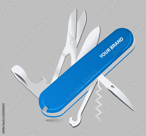 Many task blue army knife on gray background. Swiss, multipurpose knife. Multifunctional tool. Camping item. photo