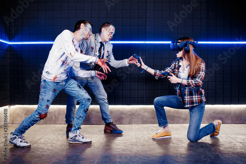 young girl and zombies in a virtual reality club