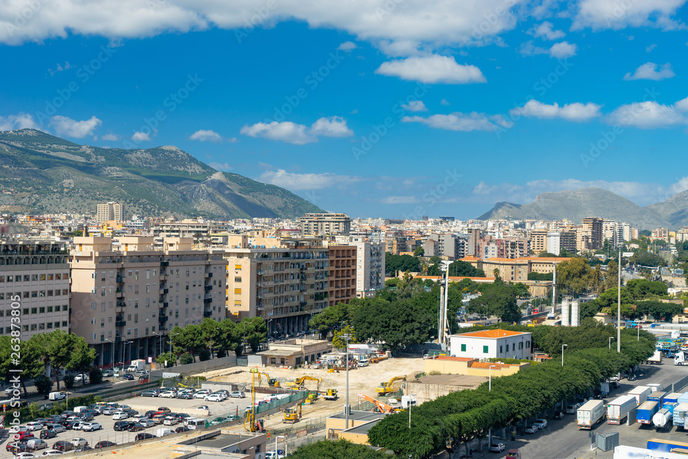 Aerial view of Palermo with mountains and clouds on background