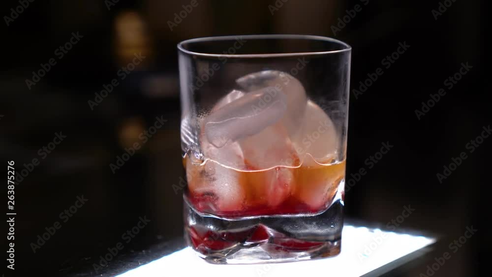 Sliding shot, showing an old fashioned on isolated background. Sliding shot, showing an old fashioned on isolated background.