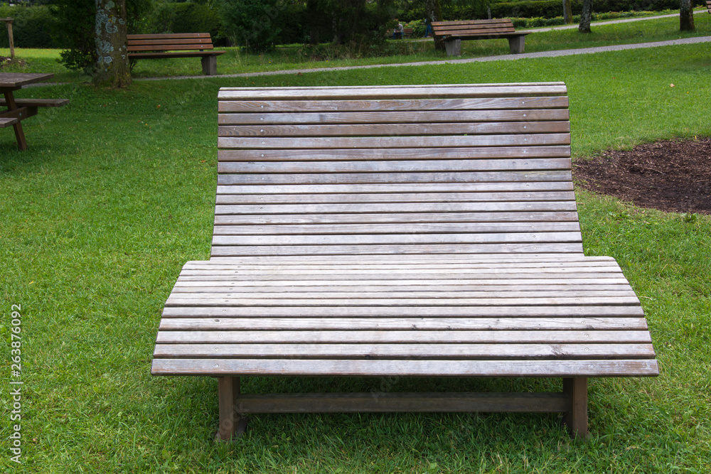A Wooden Bench in a Park in Tegernsee, Germany A Wooden Bench in a Park in Tegernsee, Germany