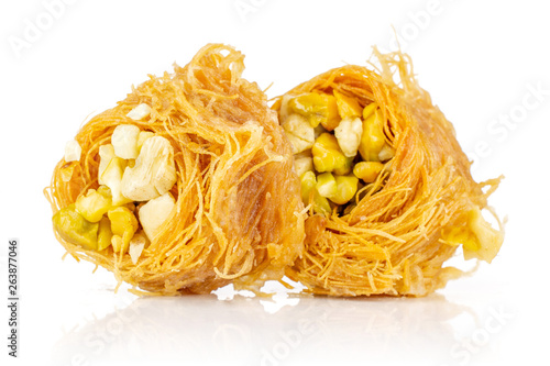 Group of two whole traditional sweet lebanese baklava piece bird nest variety isolated on white background