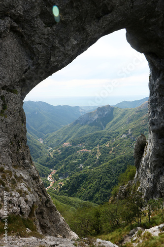 Alpi Apuane, Forte dei Marmi, Lucca, Tuscany, Italy. Arch of the Passo del Monte Forato. The town is considered of Community-environmental interest by the EEC.