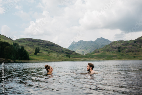 Couple swimming in the lake