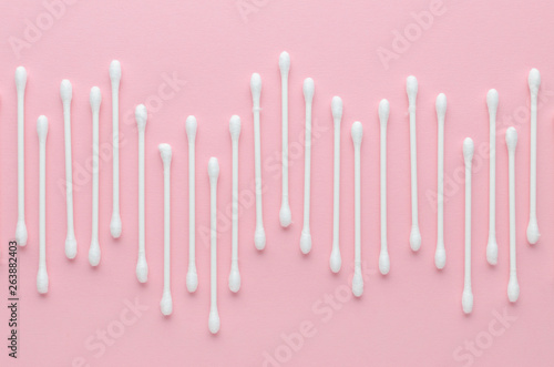 cotton sticks texture on pink background, top view © nadisja