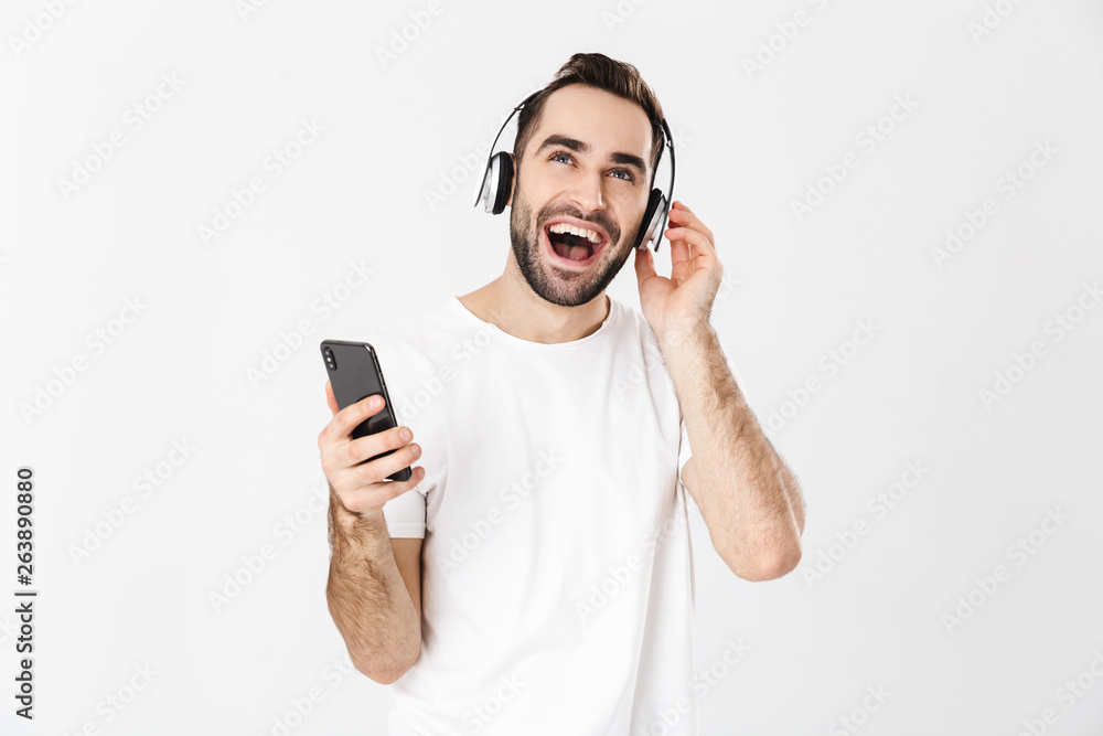 Handsome cheerful man wearing blank t-shirt Handsome cheerful man wearing blank t-shirt