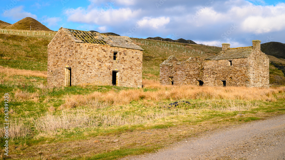 Derelict Buildings at Grove Rake Mine, the remains of the lead mine are near Rookhope in Weardale, County Durham, the last remaining headgear in the North Pennines orefield Derelict Buildings at Grove Rake Mine, the remains of the lead mine are near Rookhope in Weardale, County Durham, the last remaining headgear in the North Pennines orefield
