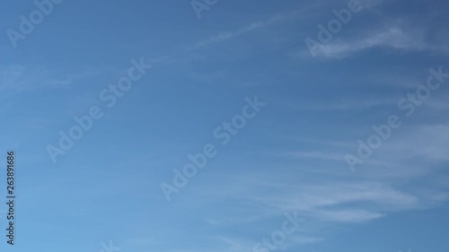 Only summer blue sky with fast moving light thin cirrus clouds. Full HD Time Lapse footage