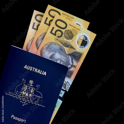 Australian passport and fifty dollar notes.