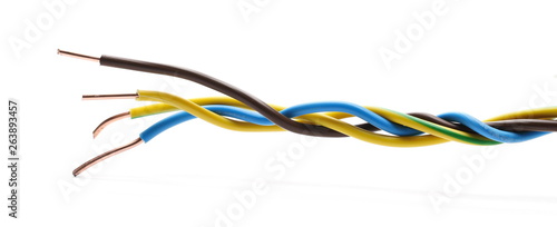 Cut insulated colorful wires isolated on white background photo