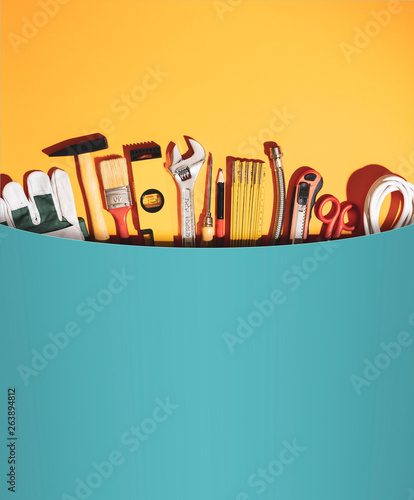 Bild auf Leinwand Huge pocket with set of DIY and home renovation tools
