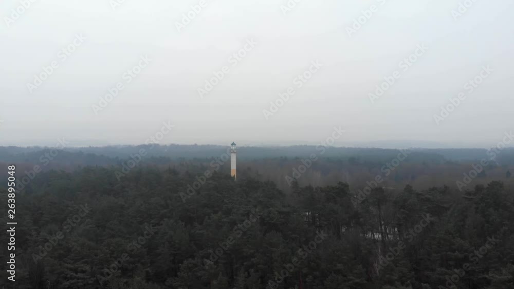 Aerial shot of Lighthouse in
boreal forest in Ustka (pomorskie, Poland) Aerial shot of Lighthouse in
boreal forest in Ustka (pomorskie, Poland)