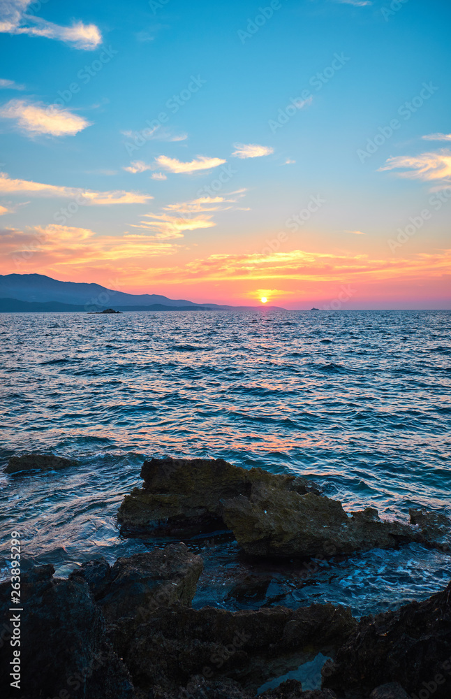 View of the sunset over Greece from Albania. The Ionian Sea.