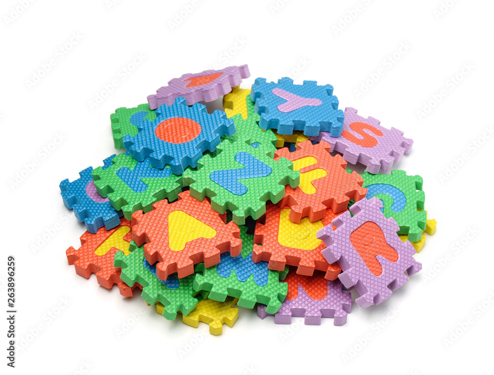 Pile of foam alphabet puzzle pieces