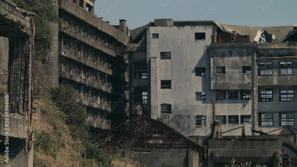 Abandoned apartment buildings on, Hashima Island, Nagasaki, Japan Abandoned apartment buildings on, Hashima Island, Nagasaki, Japan