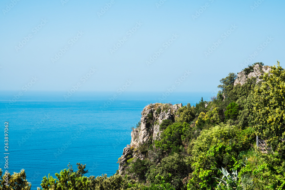 sea and mountain on the Amalfi Coast, Italy. Blue sky, space for text