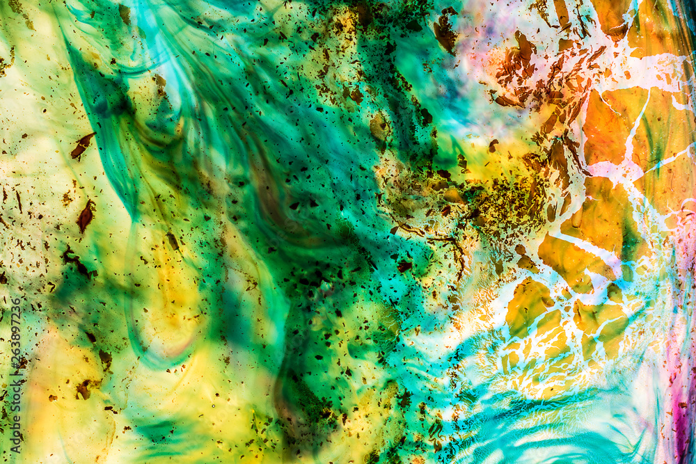 Naklejka premium Background of blue, green, yellow, red ink waves