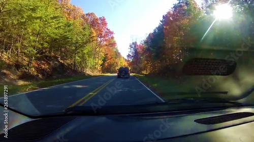 Car ride on a beautiful sunny fall day along the Cherohala Skyway in mountains of Tennessee photo