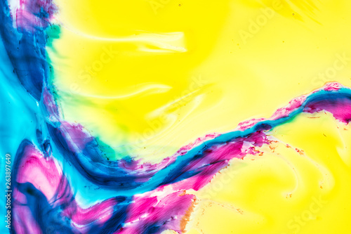 Background of pink  yellow  blue ink waves