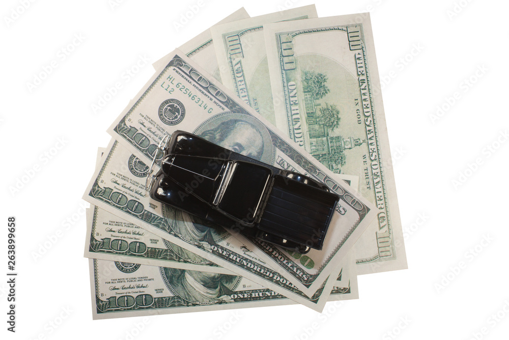 classic small decorative of model black toy car is on the banknote. classic small decorative of model black toy car is on the banknote.