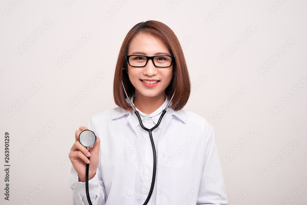young doctor woman holding stethoscope isolated on white background young doctor woman holding stethoscope isolated on white background