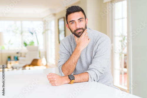 Handsome man looking relaxed and confident