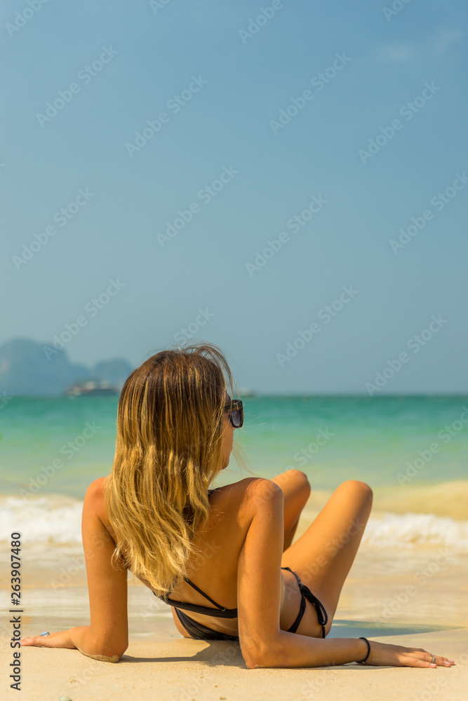 woman resting at the tropical Thailand Railay beach woman resting at the tropical Thailand Railay beach