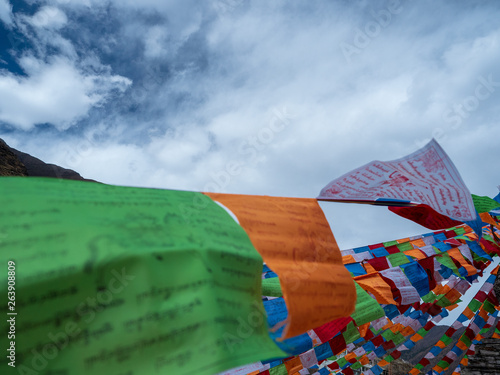 Landscape with Mount Siguniang(Four Girls Mountain, Four Sisters Mountain, Oriental Alps) Stupa and Prayer flag in Ngawa Tibetan and Qiang Autonomous Prefecture, Sichuan Province, China.