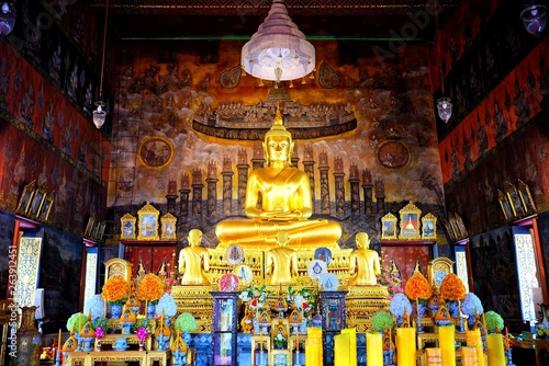 Ancient Buddha image at Wat Rakhang Kositaram temple where is a Famous Buddhist Temple and landmark in Bangkok, Thailand. © mesamong