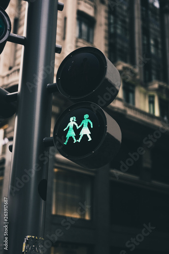 Traffic lights of a city with lesbian figures